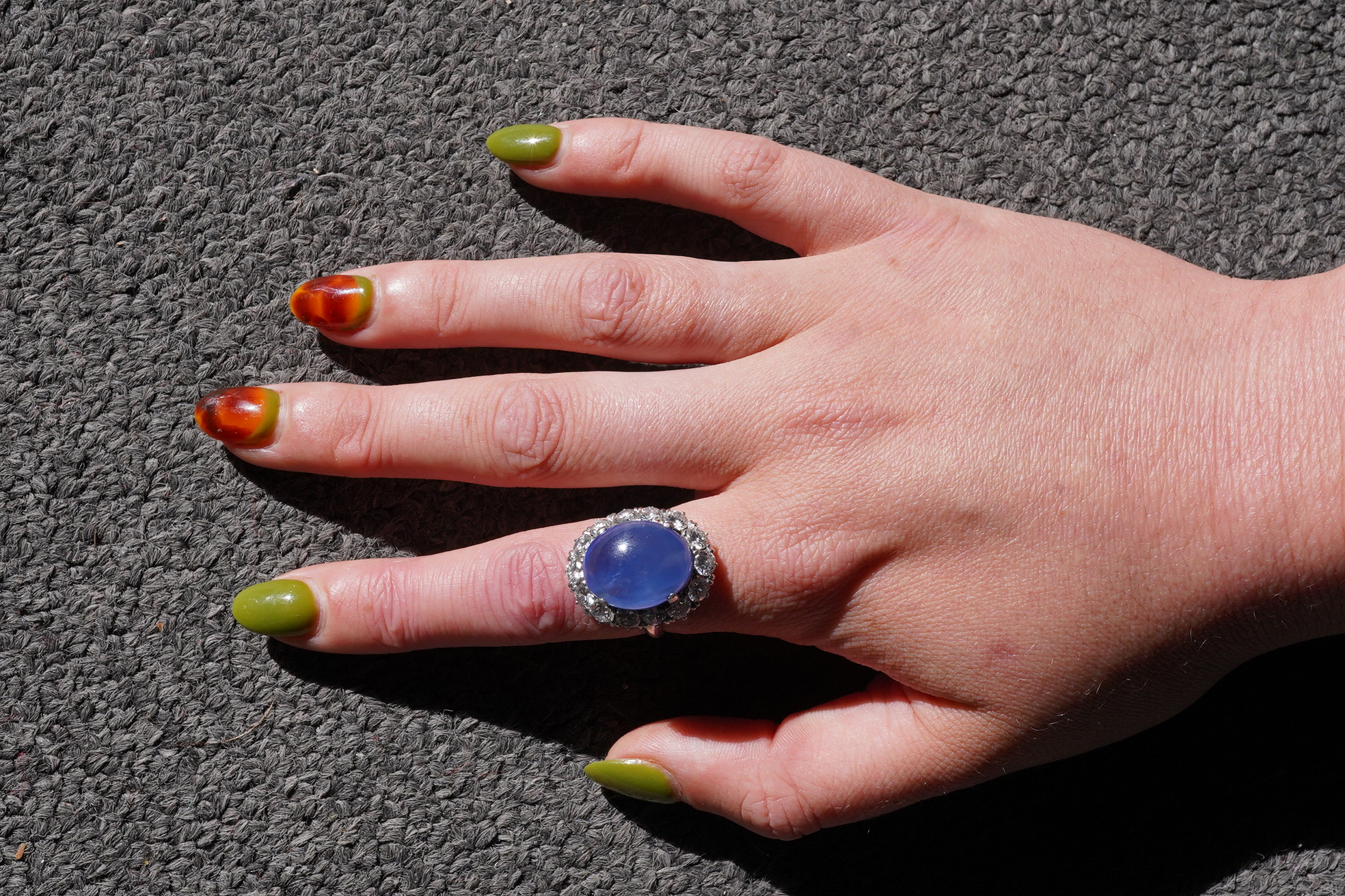 A sapphire and diamond ring, mid 20th century